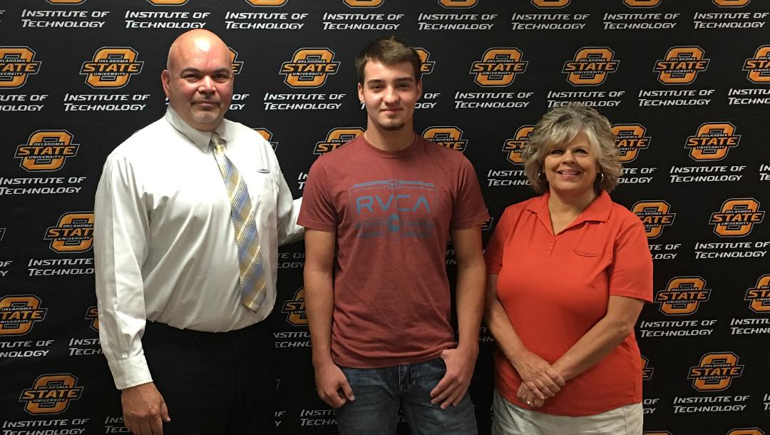 Student Timothy Sanders signed his sponsorship with Flex-N-Gate to attend OSUIT.