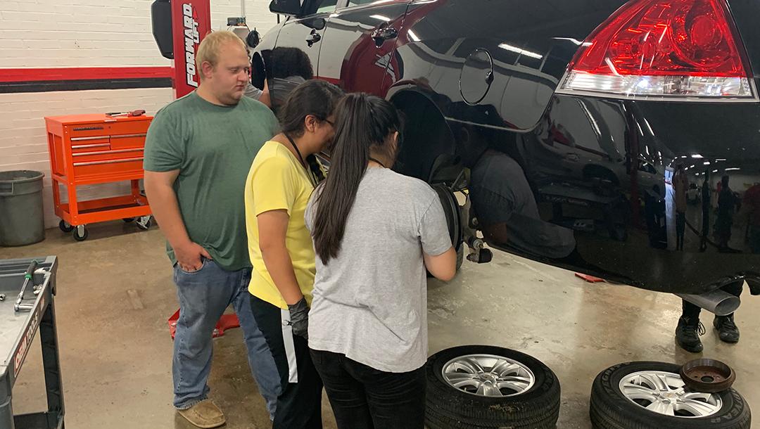 The Pro-Tech program hosted a group of 16 Upward Bound students, teaching them about vehicle maintenance, replacing brakes and using a digital oscilloscope.  